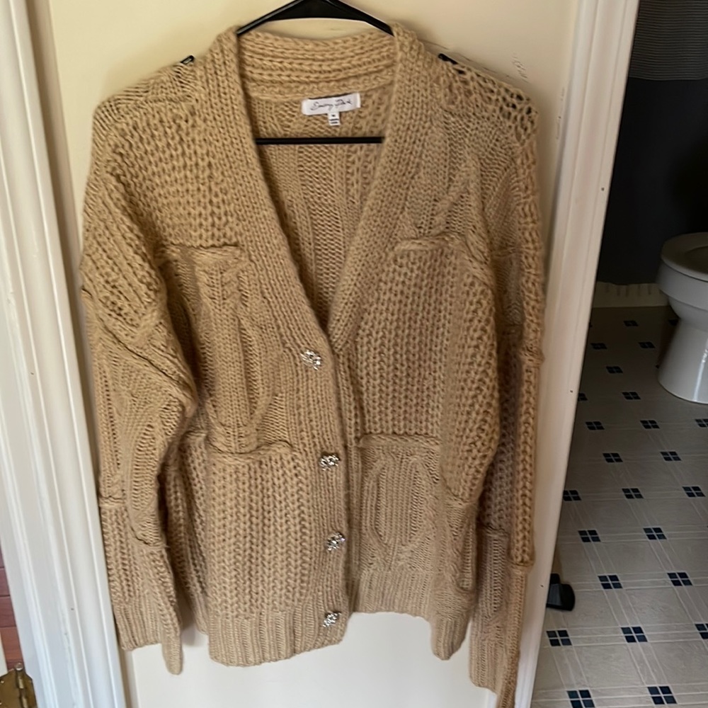 Woman’s cozy cardigan.